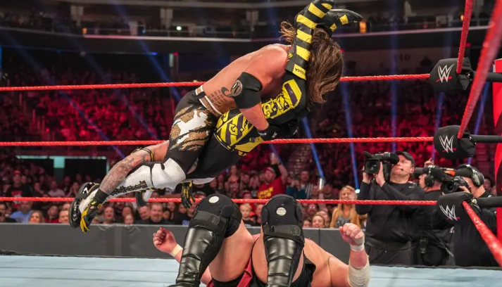 this image shows wrestlers doing high-flying moves