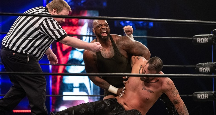 this image shows two wrestlers in a ring